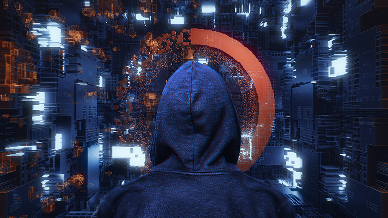 Person in a hood in front of abstract data