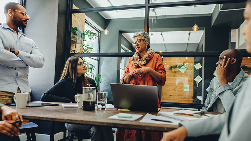 Woman giving a presentation in a conference room