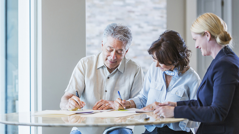 People filling out paperwork
